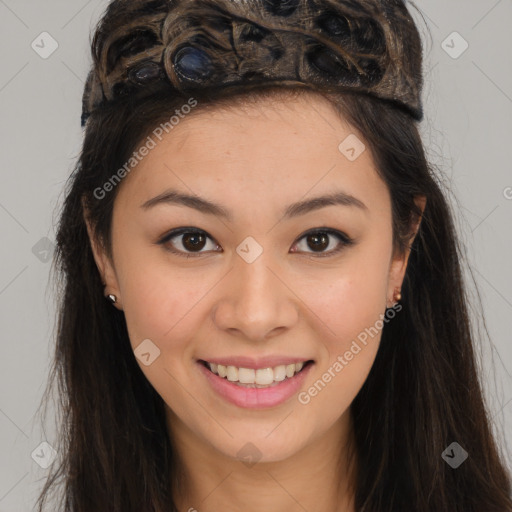 Joyful latino young-adult female with long  brown hair and brown eyes