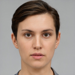 Neutral white young-adult female with short  brown hair and brown eyes