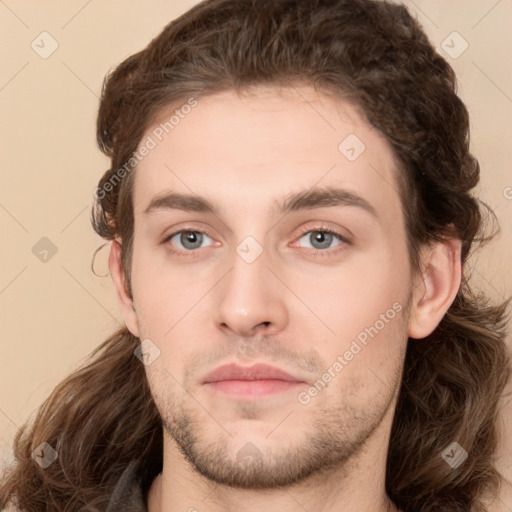 Neutral white young-adult male with medium  brown hair and brown eyes