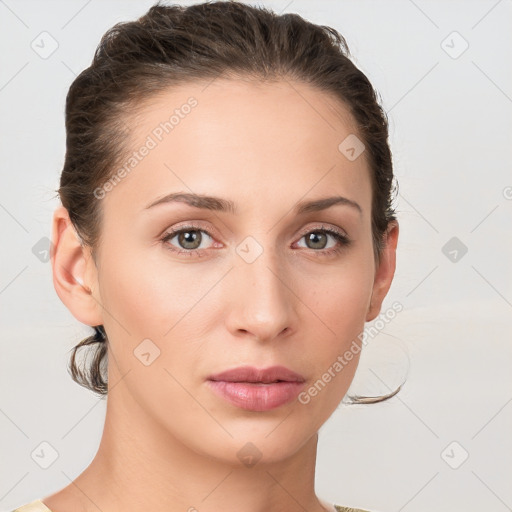 Neutral white young-adult female with medium  brown hair and grey eyes