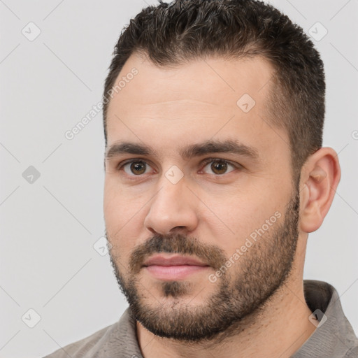 Neutral white young-adult male with short  brown hair and brown eyes