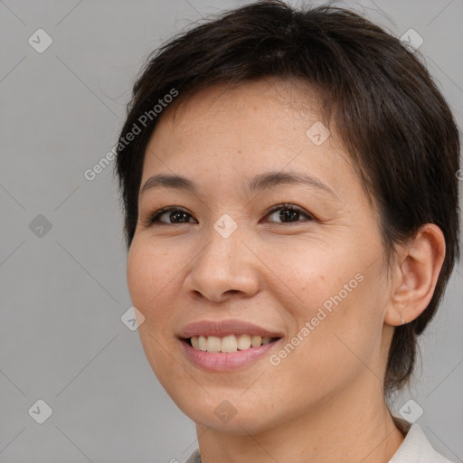 Joyful white adult female with medium  brown hair and brown eyes