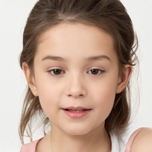 Joyful white child female with medium  brown hair and brown eyes