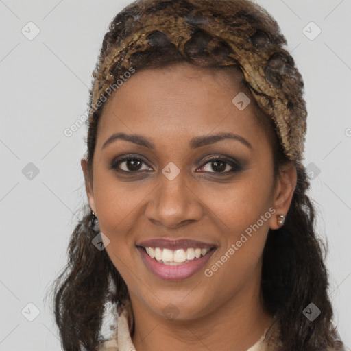 Joyful black young-adult female with long  brown hair and brown eyes