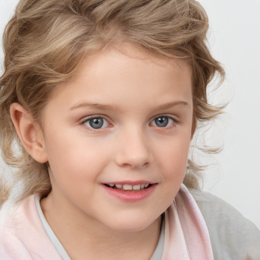 Joyful white child female with medium  brown hair and blue eyes