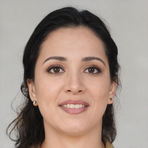 Joyful asian young-adult female with medium  brown hair and brown eyes