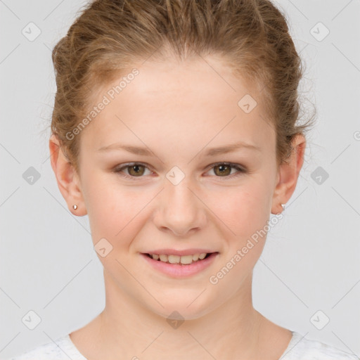 Joyful white child female with short  brown hair and brown eyes