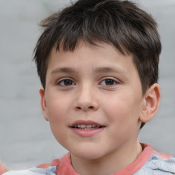 Joyful white child male with short  brown hair and brown eyes