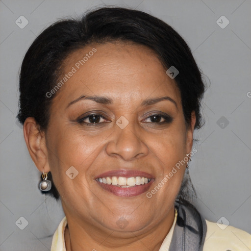 Joyful latino adult female with medium  brown hair and brown eyes