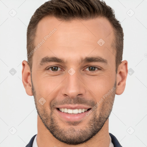 Joyful white young-adult male with short  brown hair and brown eyes