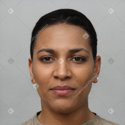 Joyful latino young-adult female with short  black hair and brown eyes