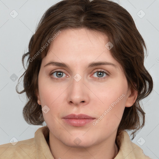 Neutral white young-adult female with medium  brown hair and grey eyes