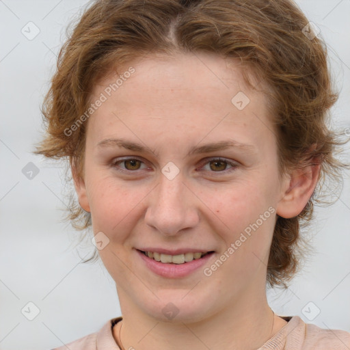 Joyful white young-adult female with medium  brown hair and blue eyes