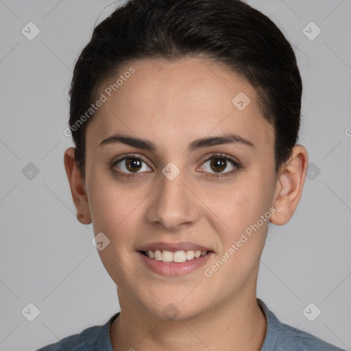 Joyful white young-adult female with short  brown hair and brown eyes