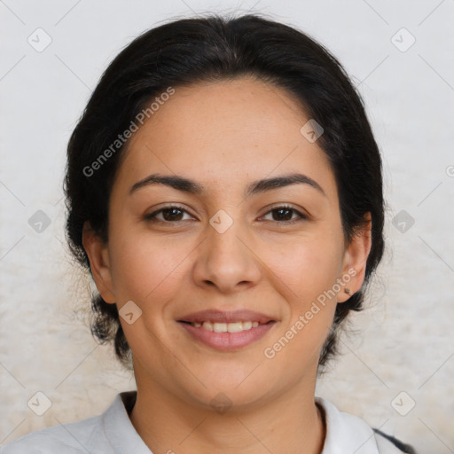 Joyful latino young-adult female with medium  brown hair and brown eyes