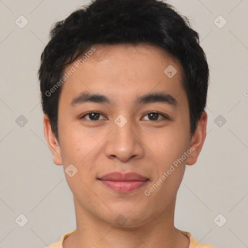 Joyful asian young-adult male with short  black hair and brown eyes