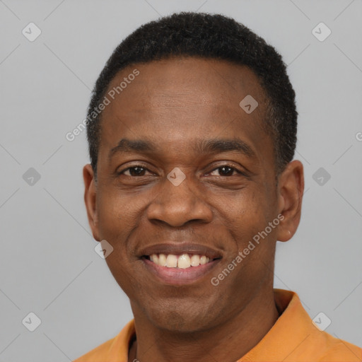 Joyful latino adult male with short  brown hair and brown eyes