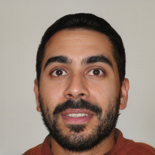 Neutral latino young-adult male with short  black hair and brown eyes