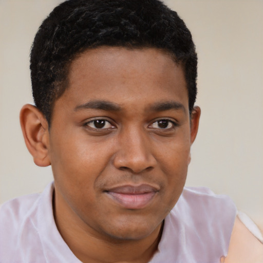 Joyful black young-adult male with short  brown hair and brown eyes
