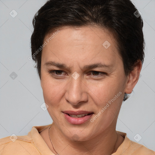 Joyful white adult female with short  brown hair and brown eyes