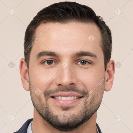 Joyful white young-adult male with short  brown hair and brown eyes