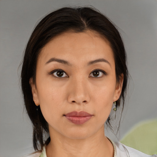 Neutral latino young-adult female with medium  brown hair and brown eyes