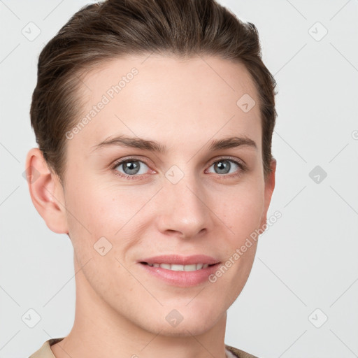 Joyful white young-adult female with short  brown hair and grey eyes