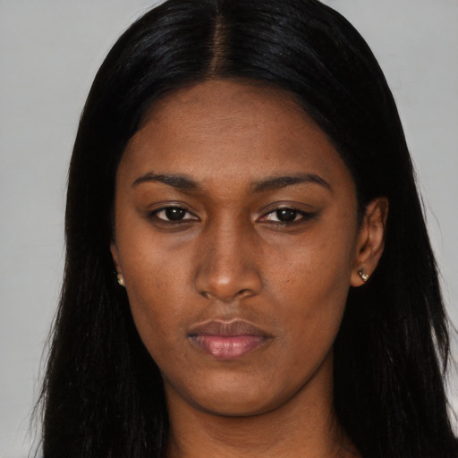 Neutral black young-adult female with long  black hair and brown eyes