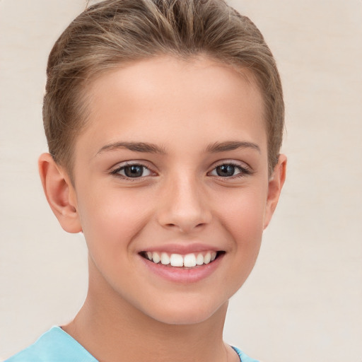 Joyful white child female with short  brown hair and brown eyes