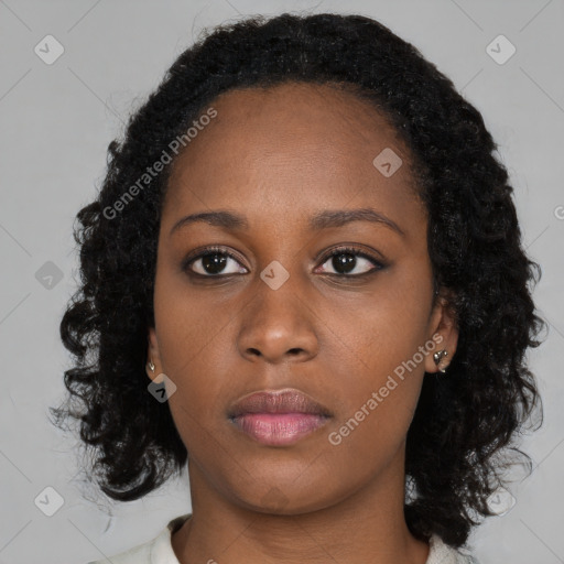 Neutral black young-adult female with long  black hair and brown eyes