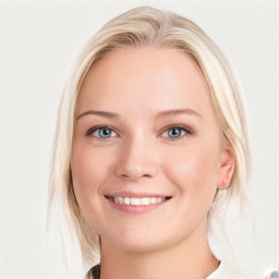 Joyful white young-adult female with medium  brown hair and blue eyes