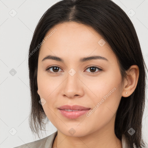 Joyful latino young-adult female with medium  brown hair and brown eyes