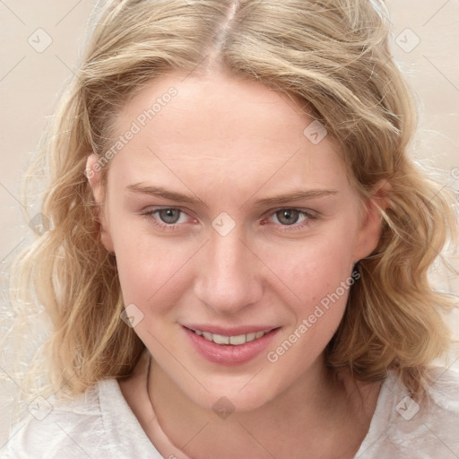 Joyful white young-adult female with medium  brown hair and blue eyes