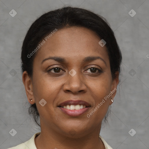 Joyful black young-adult female with short  brown hair and brown eyes