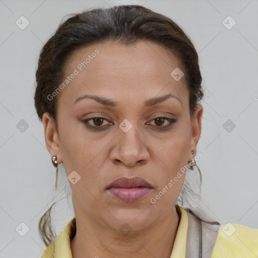 Joyful white adult female with short  brown hair and brown eyes