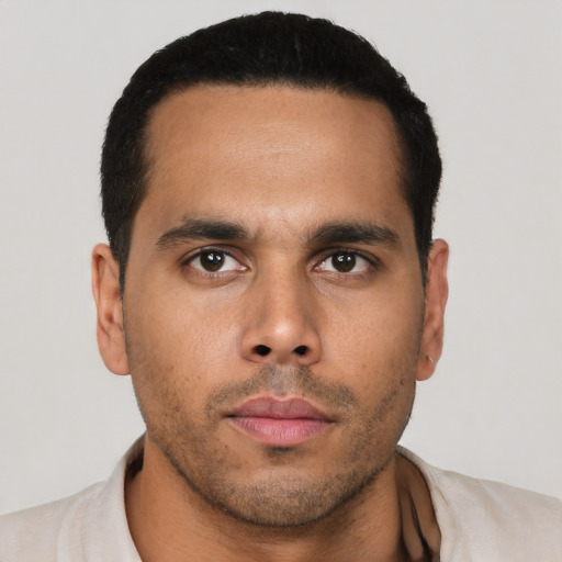 Neutral latino young-adult male with short  black hair and brown eyes