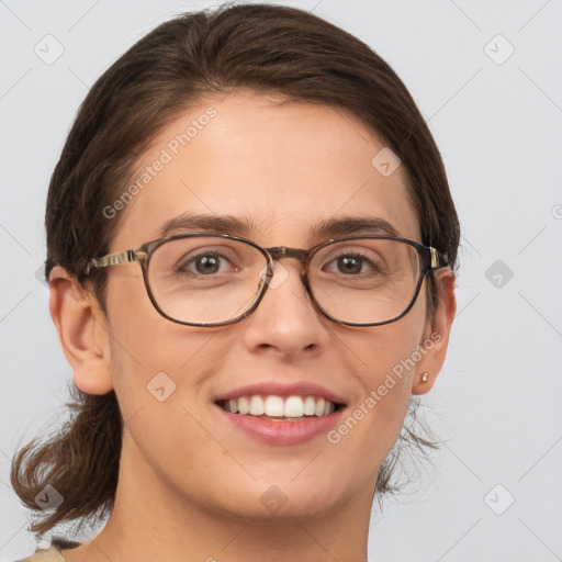 Joyful white young-adult female with medium  brown hair and grey eyes