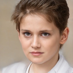 Joyful white child female with short  brown hair and brown eyes