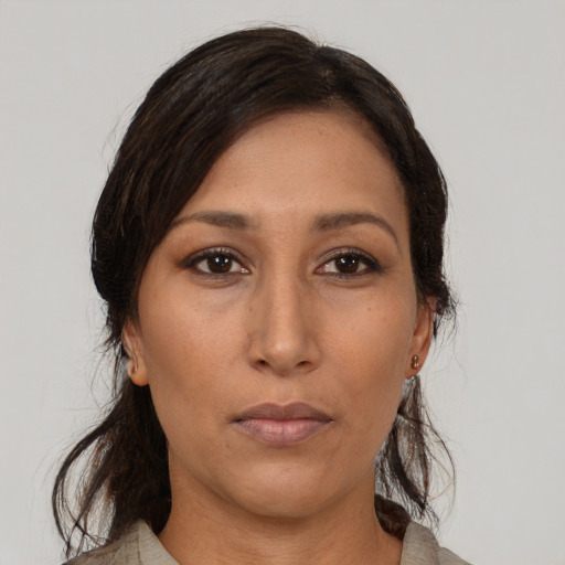 Neutral asian young-adult female with medium  brown hair and brown eyes