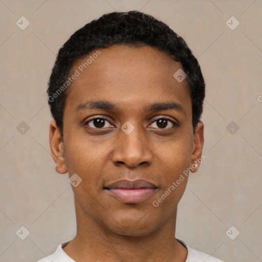 Joyful black young-adult male with short  black hair and brown eyes