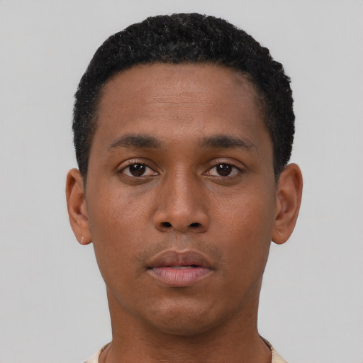 Neutral latino young-adult male with short  brown hair and brown eyes
