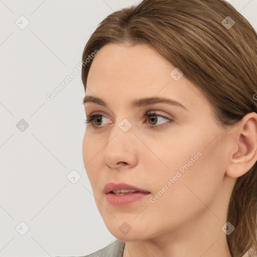 Neutral white young-adult female with medium  brown hair and brown eyes