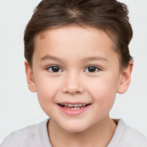 Joyful white child female with short  brown hair and brown eyes