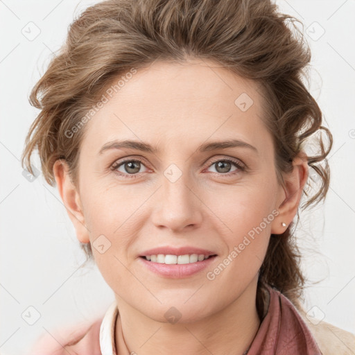 Joyful white young-adult female with medium  brown hair and blue eyes