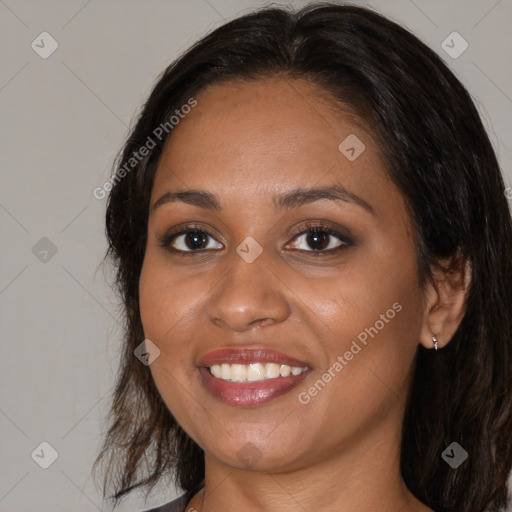 Joyful black young-adult female with medium  brown hair and brown eyes