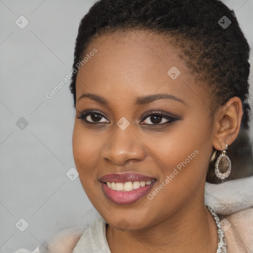 Joyful black young-adult female with short  brown hair and brown eyes