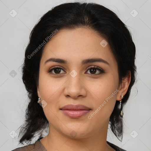 Joyful latino young-adult female with medium  brown hair and brown eyes