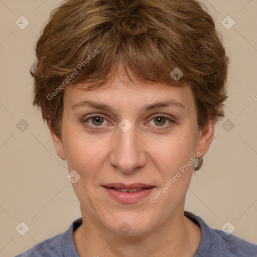 Joyful white adult female with short  brown hair and brown eyes