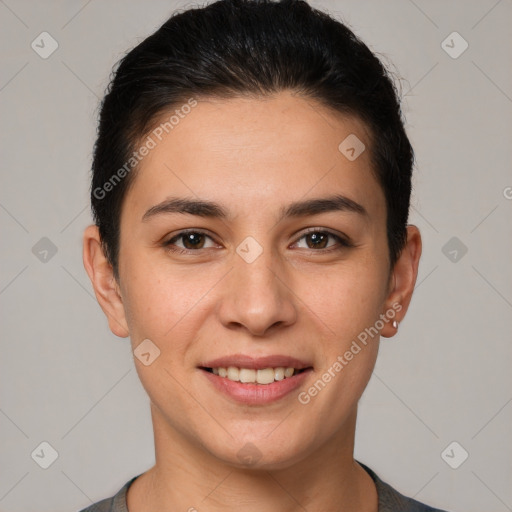 Joyful white young-adult female with short  brown hair and brown eyes