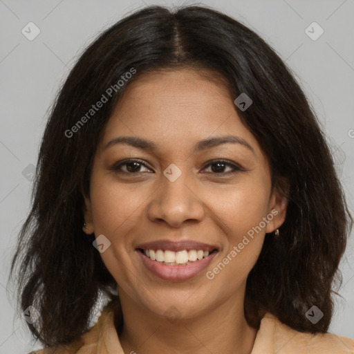 Joyful black young-adult female with medium  brown hair and brown eyes